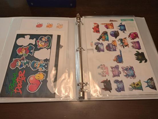 pages of stickers: cohost, rhythm doctor, slimevr