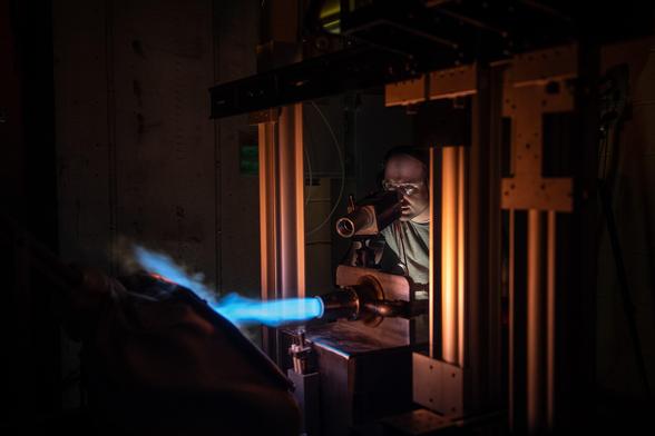 Engineering_Design_Unit_(EDU)_from_a_NASA_customer,_Radian_Aerospace,_being_tested_in_the_burner_rig_(GRC-2024-C-01483).jpg