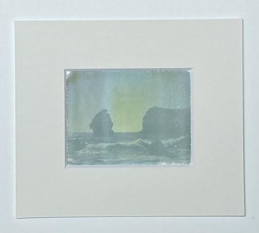 Nice transfer of a polaroid onto Arches platine paper, showing the shore and waves. Mounted