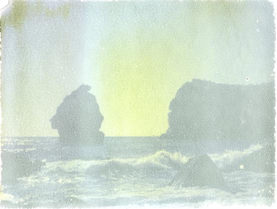 Nice transfer of a polaroid onto Arches platine paper, showing the shore and waves. Not mounted