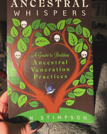 A book cover of Ancestral Whispers: A Guide to Building Ancestral Veneration Practices by Ben Stimpson. The cover shows a treehouse growing with both leaves and skulls coming from the branches