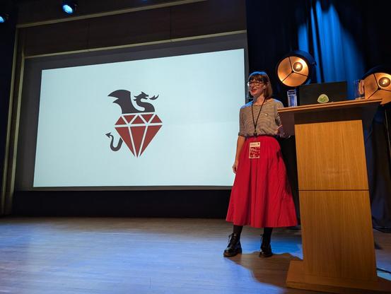 Rosa on stage at Ruby Community Conference