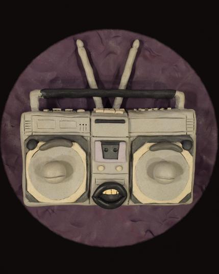 cartoon claymation boombox with eyes closed and mouth open on a purple background