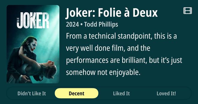 Movie poster for "Joker: Folie à Deux" (2024) directed by Todd Phillips. The left side shows a theatrical poster with a person in Joker makeup holding another person who appears unconscious. The right side displays the film title and director, along with text reading "From a technical standpoint, this is a very well done film, and the performances are brilliant, but it's just somehow not enjoyable." Below are four rating options: "Didn't Like It," "Decent" (highlighted), "Liked It," and "Loved It!"