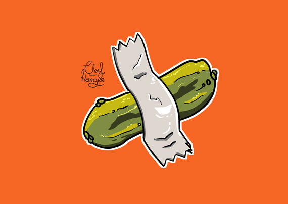 Un pepino sobre fondo naranja pegado con cinta aislante gris.