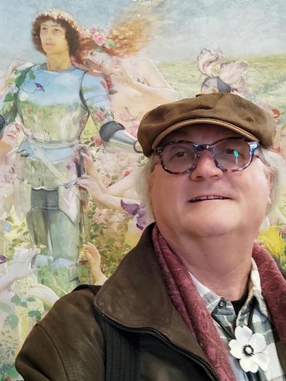 Reinhard vor dem Bild von Georges Rochegrosse "Le Chevalier aux fleurs"" (1894), es zeigt einen jungen Ritter in voller Rüstung auf einer Blumenwiese, wo nur mit Blumen bekleidete Mädchen versuchen ihn zu verführen (Szene aus Wagners ""Parsifal").