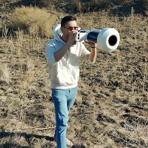 <div><img alt="" class="attachment-large size-large wp-post-image" height="625" src="https://hackaday.com/wp-content/uploads/2025/02/NERF-Rocket-Launcher-BANNED-in-7-Countries-11-15-screenshot-1-e1740699160202.png?w=625" style="margin: 0 auto; margin-bottom: 15px;" width="625" /></div><p>Nerf blasters typically fire small foam darts or little foam balls. [Michael Pick] wanted to build something altogether more devastating. To that end, <a href="https://www.youtube.com/watch?v=umT7IicqUl4" target="_blank">he created a rocket launcher with an advanced air burst capability,</a> intended to take out enemies behind cover.</p>
<p>Unlike Nerf&#8217;s own rocket launchers, this build doesn&#8217;t just launch a bigger foam dart. Instead, it launches an advanced smart projectile that releases lots of smaller foam submunitions at a set distance after firing.</p>
<p>The rocket launcher itself is assembled out of off-the-shelf pipe and 3D printed components.  An Arduino Uno runs the show, hooked up to a Bluetooth module and a laser rangefinder. The rangefinder determines the distance to the target, and the Bluetooth module then communicates this to the rocket projectile itself so it knows when to release its foamy payload after launch. Releasing the submunitions is achieved with a small microservo in the projectile which opens a pair of doors in flight, scattering foam on anyone below. The rockets are actually fired via strong elastic bands, with an electronic servo-controlled firing mec