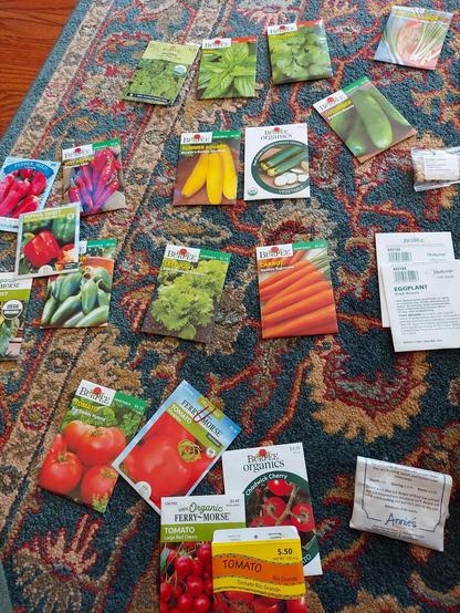 About 20 packets of seeds. Tomatoes, peppers, squash, cucumber, herbs and flowers.