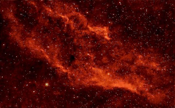 An astronomical image depicting a nebula with vibrant red and orange hues, filled with numerous stars scattered across a dark background.

Astronomiczny obraz przedstawiający mgławicę o żywych czerwonych i pomarańczowych odcieniach, wypełniona licznymi gwiazdami rozrzuconymi na ciemnym tle.