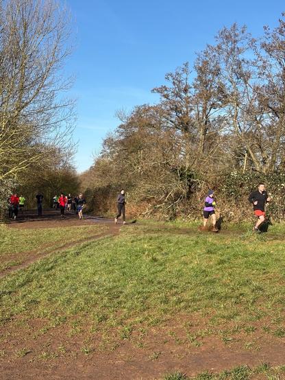 Emily running through ice cold puddles. Her foot is submerged.