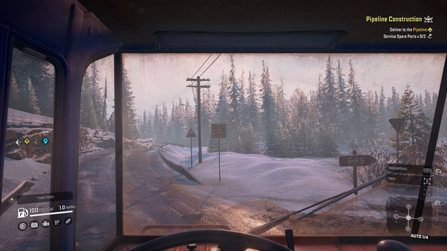 First-person view from inside a truck cab in SnowRunner, driving on a snowy, winding road surrounded by tall evergreen trees.