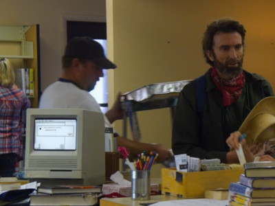 There is a Macintosh SE in the library that Ted works in.