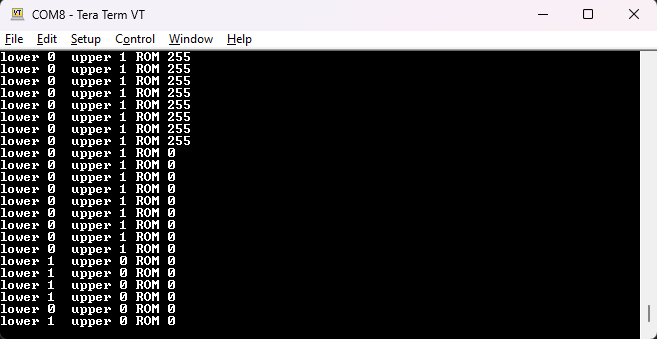 Tera Term screenshot tracking lower and upper ROM disable settings and upper ROM select value.