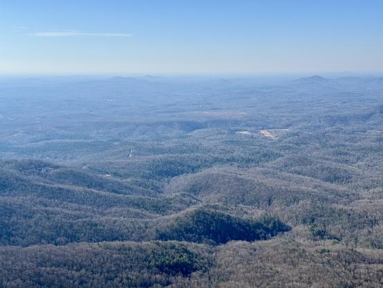 Looking toward Greenville, South Carolina which is 30 miles away. While Paris Mountain is visible, the Greenville skyline is not, due to haze.