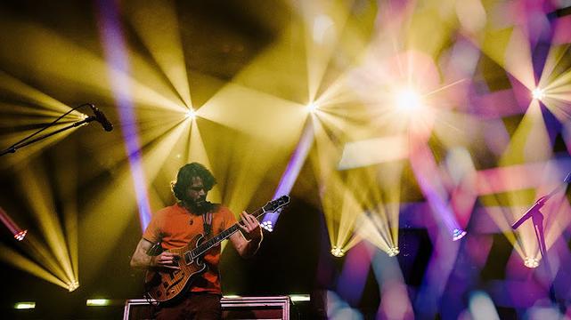 A still image of the band Goose playing live.