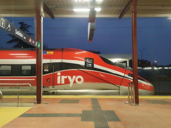 Pointy end of an Iryo Frecciarossa in Fanny-Magnet Red at Madrid Chamartin.