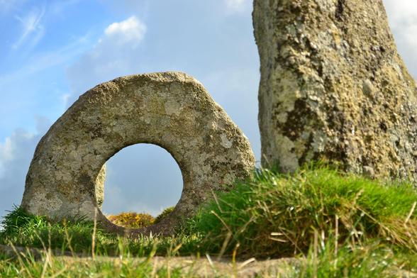 Men-An-Tol standing stones. The main one has a hole in it. Like a very big polo stuck in the ground.