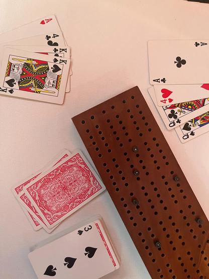 Two cribbage hands: A4Kk and A4QQ. Starter is a 3.