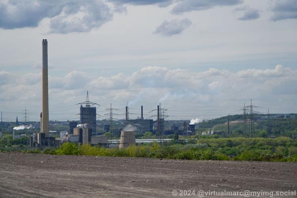 A view from a hill to the distance in the direction of the City Bottrop where you can see the sill active coking plant Prosper.