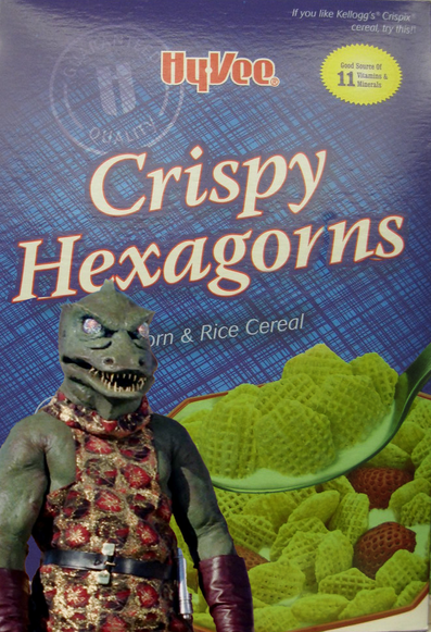A hy vee brand cereal box that said "crispy hexagons" but I altered it by adding a star trek TOS gorn and changed it to "crispy hexagorns"
