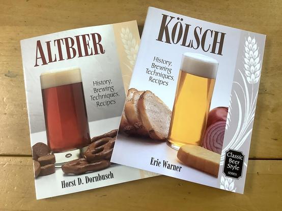 A photo of two different books:

Kölsch: History, Brewing Techniques, Recipes
by Eric Warner

Altbier: History, Brewing Techniques, Recipes
by Horst D. Dornbusch