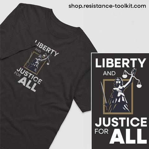 A black T-shirt featuring a design of Lady Justice holding a sword and scales, enclosed in a gold frame. Above and below the illustration, the words 'LIBERTY AND JUSTICE FOR ALL' are written in bold white and gold letters. The design is also displayed separately in a close-up beside the shirt.