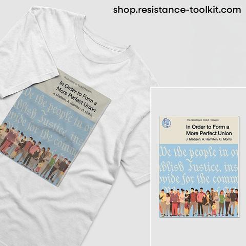A white T-shirt featuring a graphic design that resembles a classic book from the the 1960's. The book is titled 'In Order to Form a More Perfect Union' by J. Madison, A. Hamilton, and G. Morris. The design includes a parchment-colored top section with the title and authors, while the lower section features a blue background with excerpts of the U.S. Constitution in script and an illustration of a diverse group of people standing together. The same design is also displayed separately in a close-up beside the shirt. The website 'shop.resistance-toolkit.com' is shown at the top of the image.