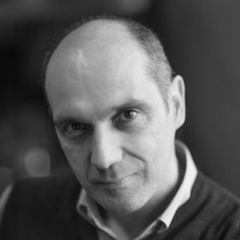 Black and white portrait photography of Enrico Motta.