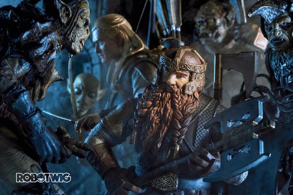 Gimli and Legolas are surrounded by Orcs