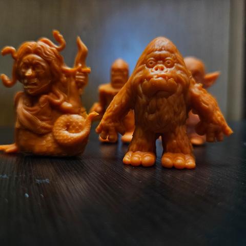 Bigfoot, Medusa and the rest of our monstrous minis in orange.