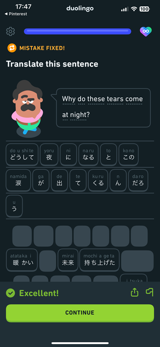 A lesson question from DuoLing asking the user to translate the sentence, “why do these tears come at night?” into Japanese. The app provides vocabulary but no grammar help.