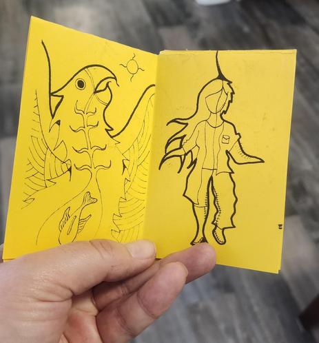 Mini zine by Danilynn Jiibay. Pages 2 and 3.

Page 2: Depiction of eagle or thunderbird eating a fish on a sunny day; in woodland art style.

Page 3: Depiction of two spirit individuals depicted as split entities. Left is a woman, and right is a man.
