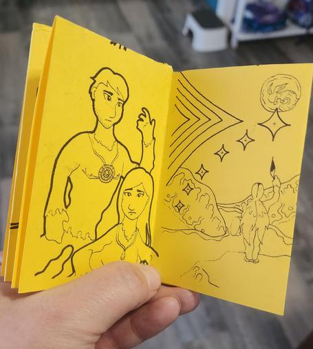 Mini zine by Danilynn Jiibay. Pages 6 and 7.

Page 6: Depiction of indigenous trans man and trans woman in traditional deer skin regalia lounging and vibing in the moment.

Page 7: Depiction of Nanaboozhoo raising their feather to their sibling Jiibayaaboose at nighttime. A series shooting stars are also depicted as well as a progress-like arched rainbow and fields with water landmarks.