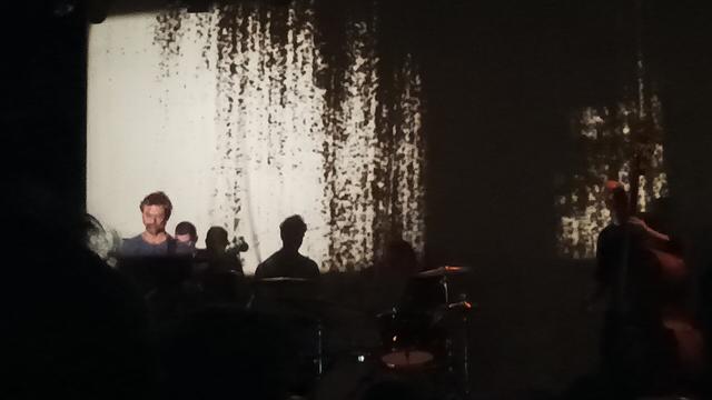 Pic of the show, motly darkness with a few guys and their shadows
