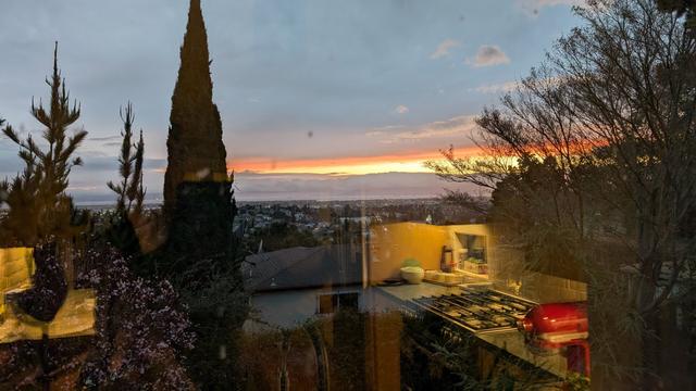 A reflective sunset from a kitchen in Oakland