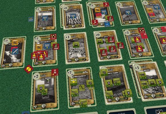 Tabletop simulator picture of a Fields of Fire map made up of many terrain cards and enemy and friendly US positions midgame. The mission is Naktong and most of the North Korean squads and mortar spotters are taking it to the Americans, often hidden on many of the cards on the front.
