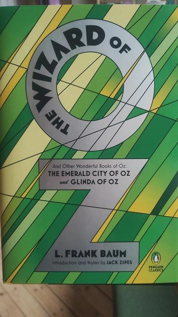 Front cover, suitably in emerald green shades, for a hardback of The Wizard of Oz