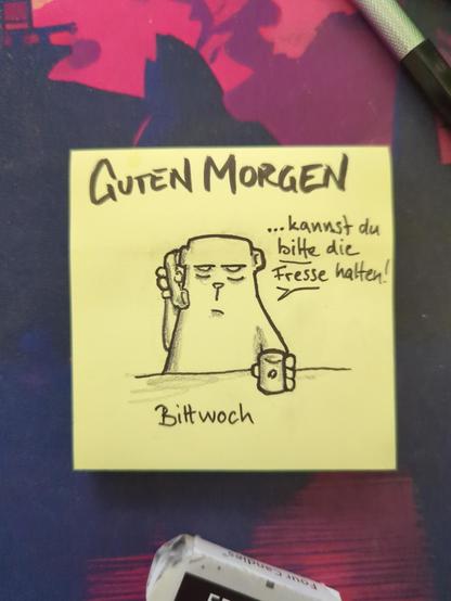 Auf einer gelben Haftnotiz steht "Guten Morgen"
Darunter ist der officebear am Telefon zu sehen, der fragt "kannst du bitte die Fresse halten! 

Heute ist Bittwoch