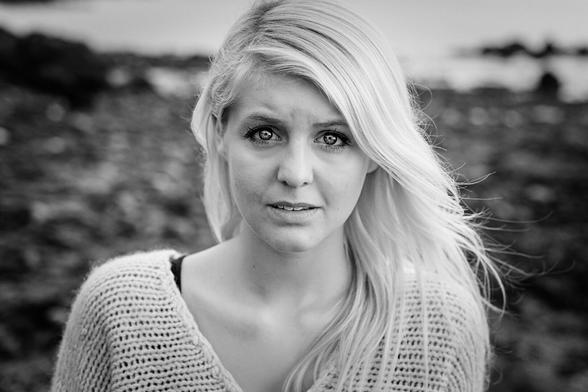 Portrait of a young woman looking intensely into the camera