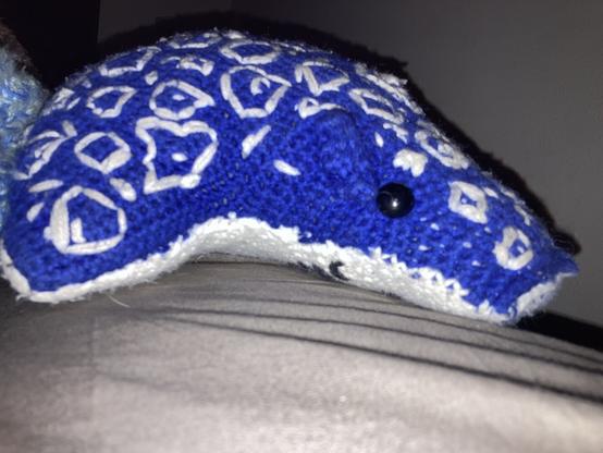 A close-up of the profile of the plush