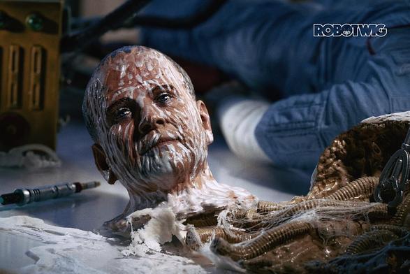 Ash's decapitated android head on a table