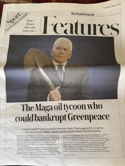 A newspaper feature of Kelsy Warren, Energy Transfers CEO, depicted holding a shovel as the headline reads: ‘The MAGA oil tycoon who could bankrupt Greenpeace’