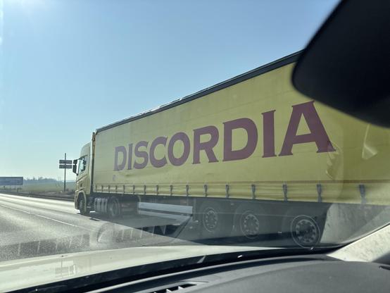 Discordia company yellow semi truck
