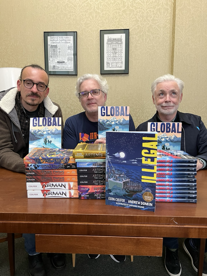 Three handsome men and their books.