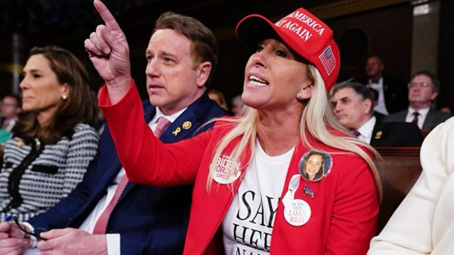 marjorie taylor greene, in violation of Congressional dress code, heckles Biden