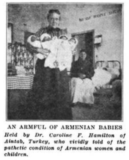 A photo of Caroline Frances Hamilton holding at least four babies in a hospital nursery in Turkey; caption: "An Armful of Armenian Babies Held by Dr. Caroline F. Hamilton of Aintab, Turkey, who vividly told of the pathetic condition of Armenian women and children"