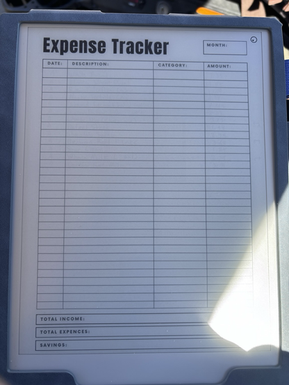 A picture of a remarkable tablet with an expense tracker page showing