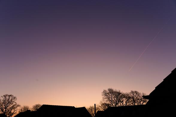 Morning twilight sky with a striking pink color.