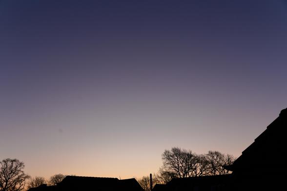 Normal bluish morning twilight sky.