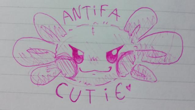 FR: un dessin au stylo rose d'un visage d'un axolotl en peluche en style cartoon, souriant, avec des joues roses et de grands cils. Il y a écrit autour "antifa cutie", cutie signifiant mignon·ne en anglais. Fin texte alternatif.
ENG: a pink pen drawing of a cartoon-style face of an axolotl plushie, smiling, with pink cheeks and big eyelashes. It says "antifa cutie" around it.